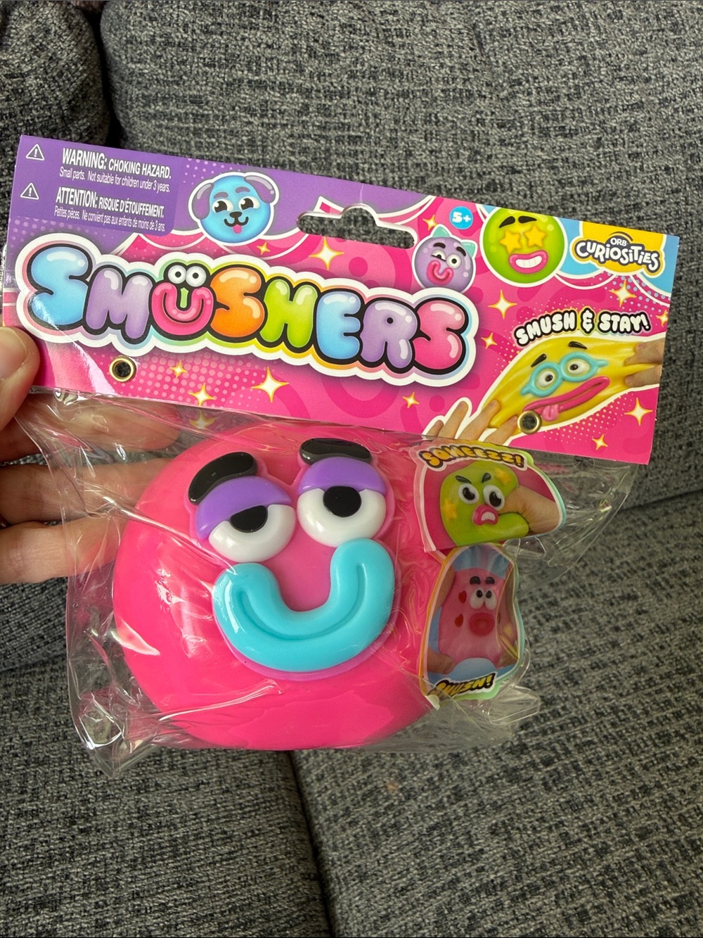 BNIB ORB Curiosities SMUSHERS Squishy, Dark Pink Face